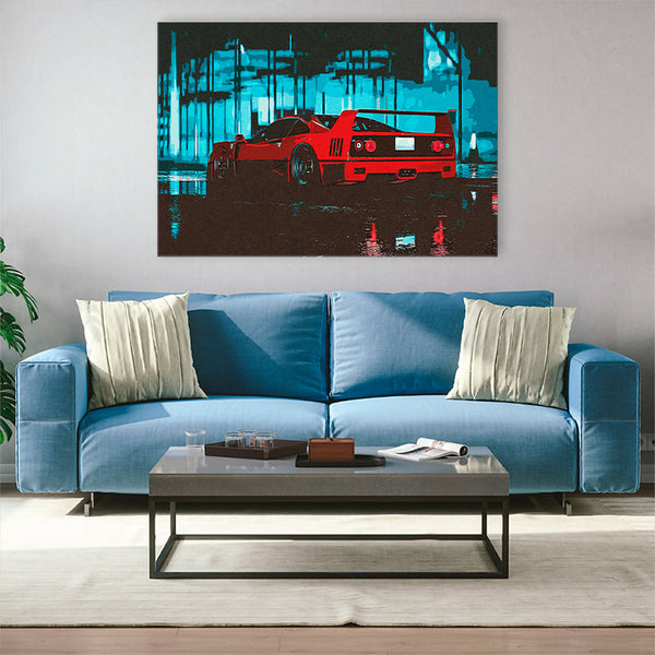 Ferrari F40 sur tableau dans le salon au dessus d'un canapé bleu